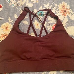 Like new Zyia strappy light and tight sports bra - Fig vibrations print